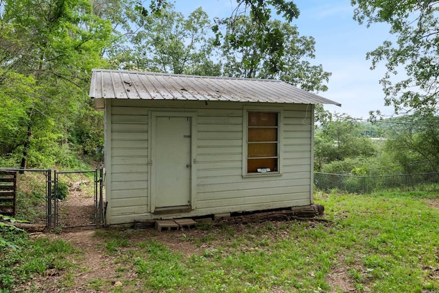 2515 N Dr, North Little Rock, AR 72118 - view of shed featuring a gate