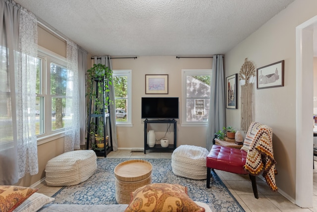 2515 N Dr, North Little Rock, AR 72118 - living room with a textured ceiling and tile patterned floors