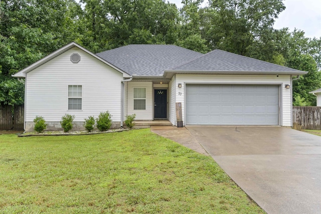 70 Peach St, Austin, AR 72007 - ranch-style house featuring concrete driveway, a garage, and roof with shingles
