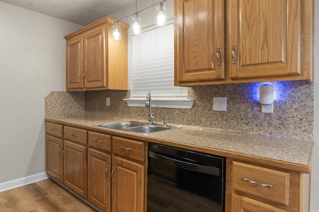 70 Peach St, Austin, AR 72007 - kitchen with dishwasher, backsplash, and wood finished floors