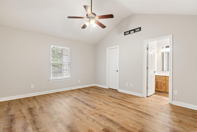 70 Peach St, Austin, AR 72007 - unfurnished bedroom with light wood-style flooring, ensuite bathroom, high vaulted ceiling, and a ceiling fan