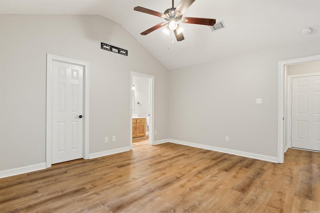 70 Peach St, Austin, AR 72007 - unfurnished bedroom featuring vaulted ceiling, light wood-style flooring, connected bathroom, and ceiling fan
