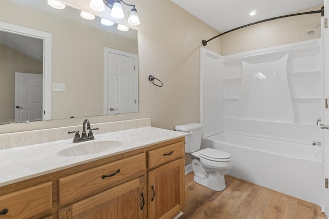 70 Peach St, Austin, AR 72007 - bathroom with vanity, shower / bathtub combination, and wood finished floors
