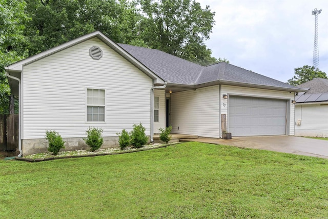 70 Peach St, Austin, AR 72007 - ranch-style home featuring concrete driveway, an attached garage, a front lawn, and roof with shingles