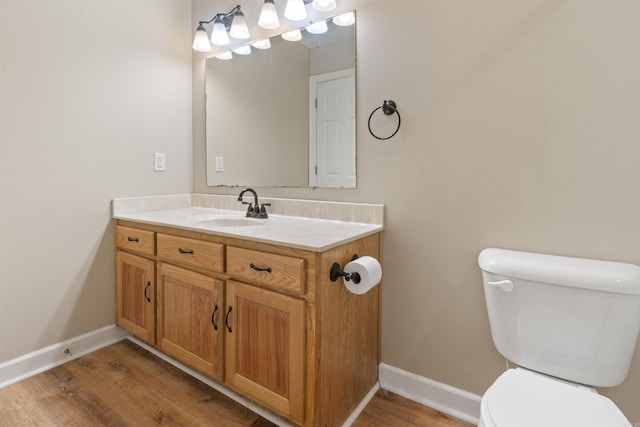 70 Peach St, Austin, AR 72007 - half bathroom featuring vanity and wood finished floors