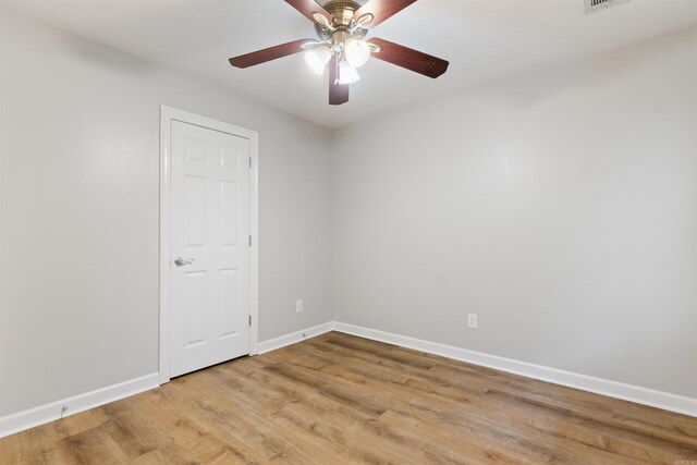 70 Peach St, Austin, AR 72007 - empty room with a ceiling fan and light wood-type flooring