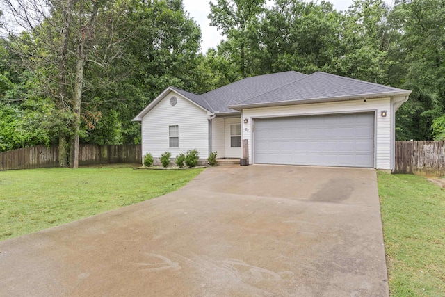 70 Peach St, Austin, AR 72007 - ranch-style home with concrete driveway, an attached garage, and a shingled roof