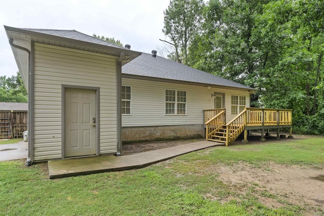 70 Peach St, Austin, AR 72007 - rear view of house featuring a deck and a shingled roof