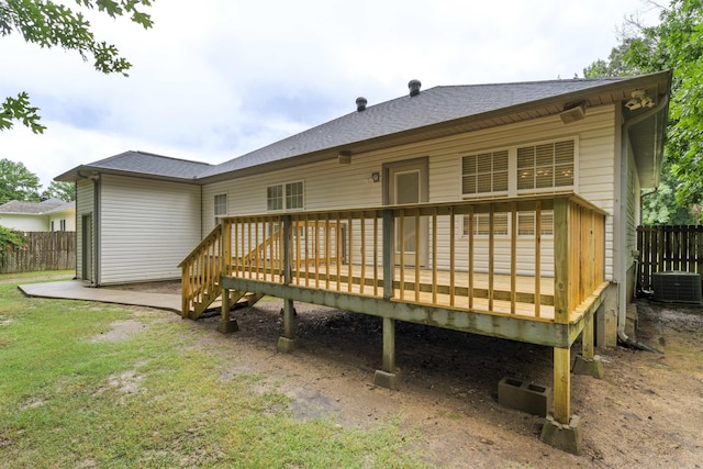 70 Peach St, Austin, AR 72007 - back of property featuring a shingled roof and a deck