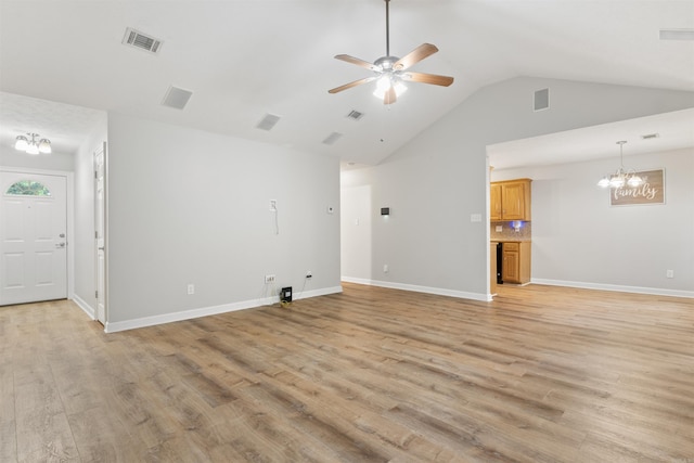 70 Peach St, Austin, AR 72007 - unfurnished living room with a chandelier, a ceiling fan, light wood-style flooring, and high vaulted ceiling