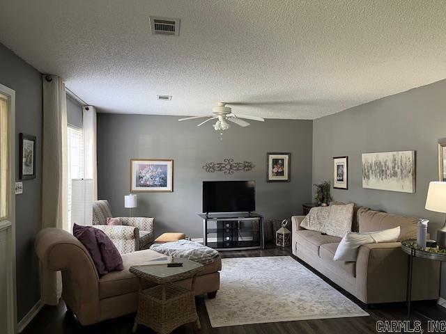600 Higdon Ferry Rd Unit 301, Hot Springs, AR 71913 - living area featuring ceiling fan, dark wood finished floors, and a textured ceiling