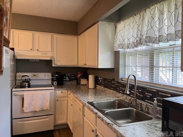 600 Higdon Ferry Rd Unit 301, Hot Springs, AR 71913 - kitchen featuring white appliances, under cabinet range hood, white cabinets, and a textured ceiling