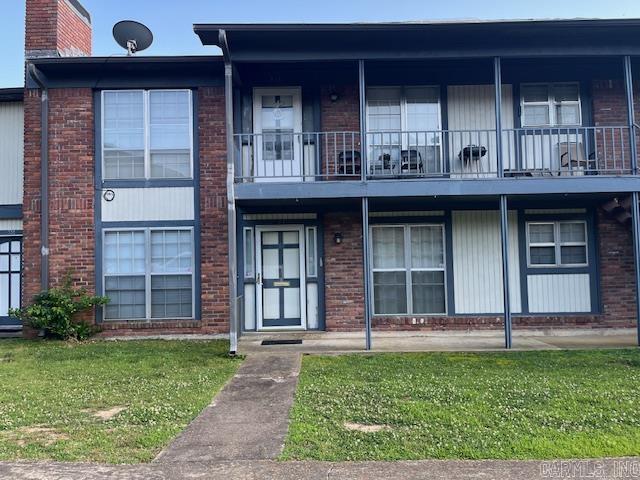 600 Higdon Ferry Rd Unit 301, Hot Springs, AR 71913 - multi unit property with brick siding, a front lawn, a balcony, and a chimney