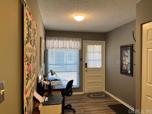 600 Higdon Ferry Rd Unit 301, Hot Springs, AR 71913 - doorway featuring a textured ceiling, wood finished floors, and a desk