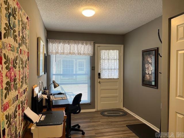600 Higdon Ferry Rd Unit 301, Hot Springs, AR 71913 - office space featuring a textured ceiling, wood finished floors, and plenty of natural light