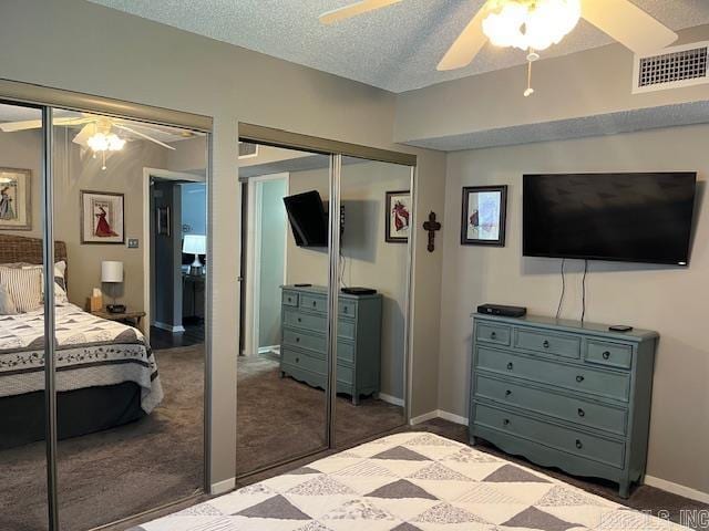 600 Higdon Ferry Rd Unit 301, Hot Springs, AR 71913 - bedroom with carpet flooring, two closets, ceiling fan, and a textured ceiling
