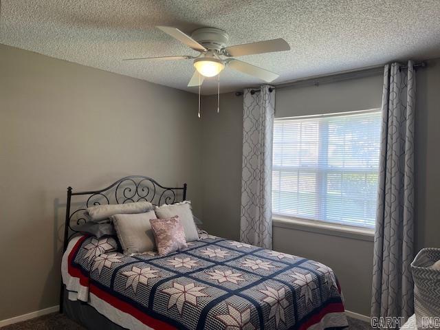 600 Higdon Ferry Rd Unit 301, Hot Springs, AR 71913 - bedroom with carpet floors, a textured ceiling, and ceiling fan