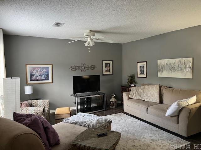 600 Higdon Ferry Rd Unit 301, Hot Springs, AR 71913 - living area with a ceiling fan, wood finished floors, and a textured ceiling