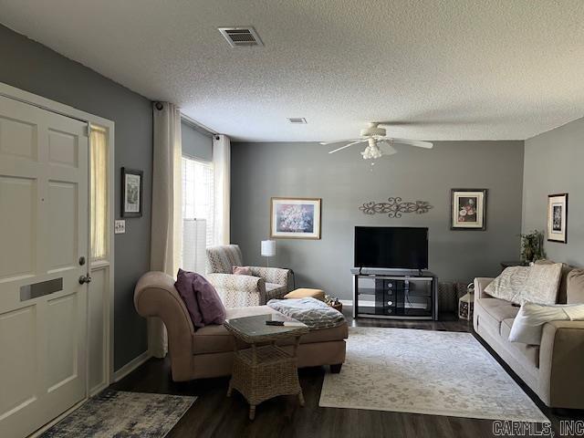 600 Higdon Ferry Rd Unit 301, Hot Springs, AR 71913 - living room with dark wood-type flooring, ceiling fan, and a textured ceiling