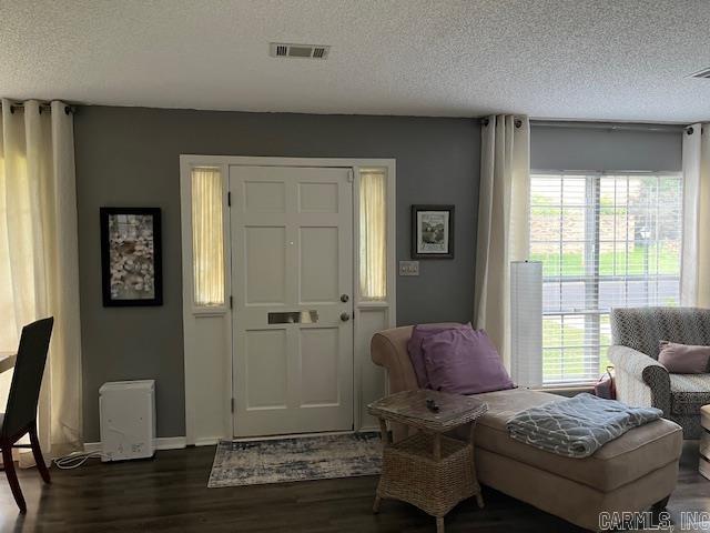 600 Higdon Ferry Rd Unit 301, Hot Springs, AR 71913 - entrance foyer featuring a textured ceiling and dark wood-style flooring