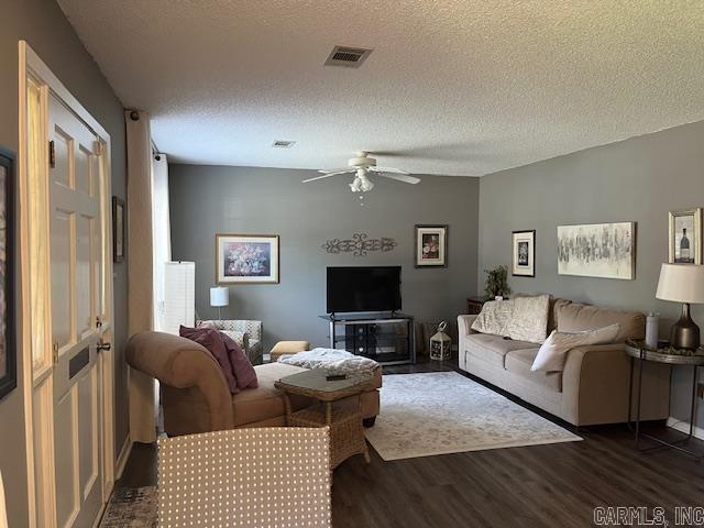 600 Higdon Ferry Rd Unit 301, Hot Springs, AR 71913 - living room with dark wood finished floors, ceiling fan, and a textured ceiling