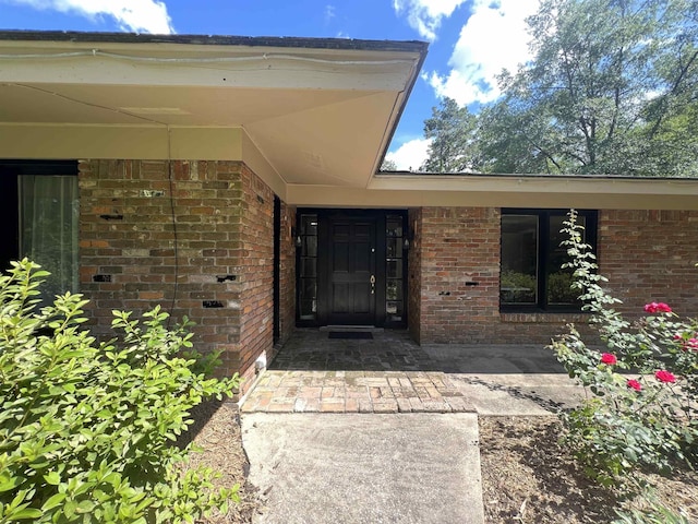 114 Mark Cir, Monticello, AR 71655 - view of exterior entry featuring brick siding