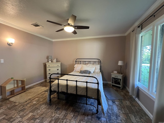 114 Mark Cir, Monticello, AR 71655 - bedroom featuring crown molding and a ceiling fan