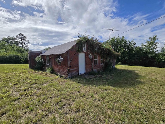 394 Otis Rd, Clinton, AR 72031 - view of grassy yard featuring an outdoor structure