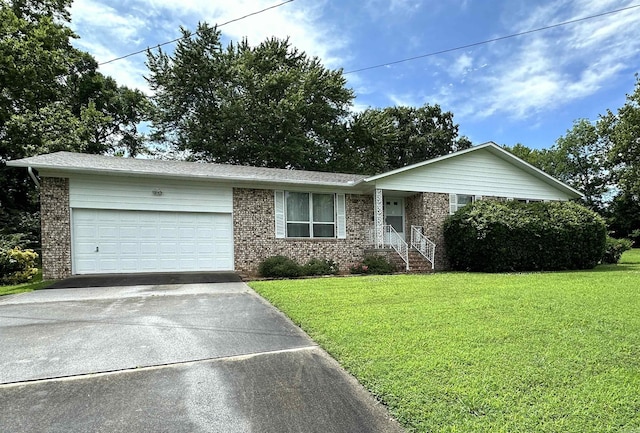 504 Case St, Heber Springs, AR 72543 - single story home with brick siding, driveway, a front yard, and an attached garage