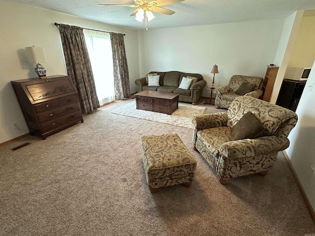 504 Case St, Heber Springs, AR 72543 - living room with light colored carpet and a ceiling fan
