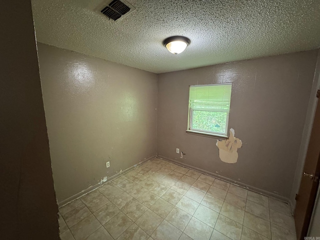 4114 W 10th Ave, Pine Bluff, AR 71603 - unfurnished room featuring a textured ceiling