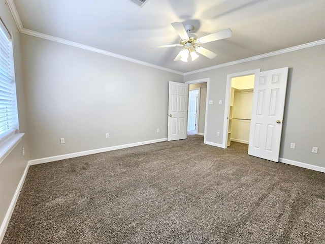 158 Calais, Maumelle, AR 72113 - unfurnished bedroom featuring ornamental molding, dark carpet, a walk in closet, and multiple windows