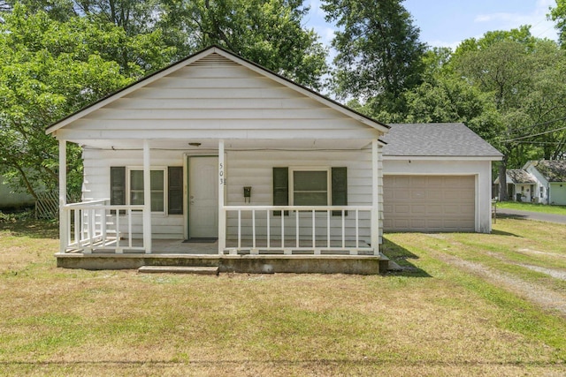 503 N Walnut St, Searcy, AR 72143 - bungalow-style home featuring covered porch, dirt driveway, a front lawn, and roof with shingles