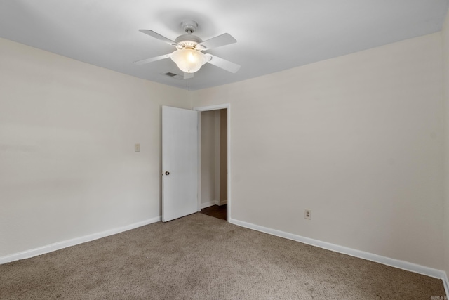 503 N Walnut St, Searcy, AR 72143 - empty room featuring carpet flooring and a ceiling fan