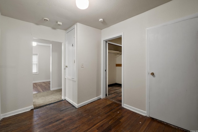503 N Walnut St, Searcy, AR 72143 - unfurnished bedroom with dark wood-type flooring and a closet