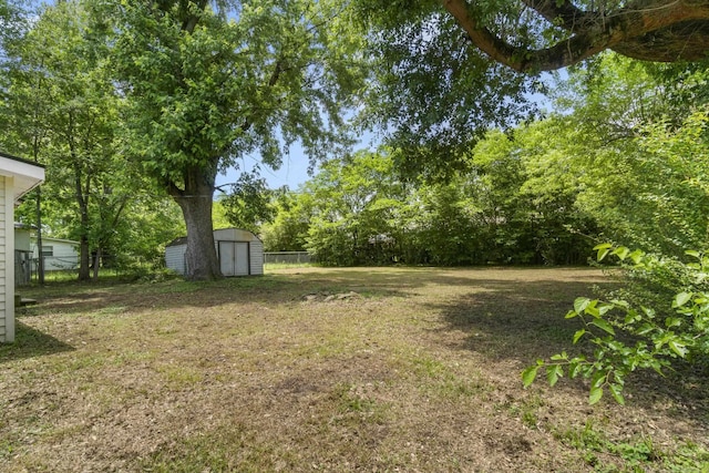 503 N Walnut St, Searcy, AR 72143 - view of yard with a storage shed