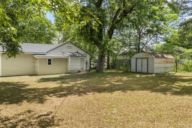 503 N Walnut St, Searcy, AR 72143 - view of green lawn featuring a storage unit