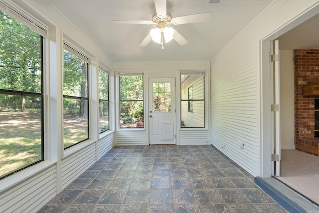 12611 Timber Bend Dr, Little Rock, AR 72211 - unfurnished sunroom featuring ceiling fan and plenty of natural light