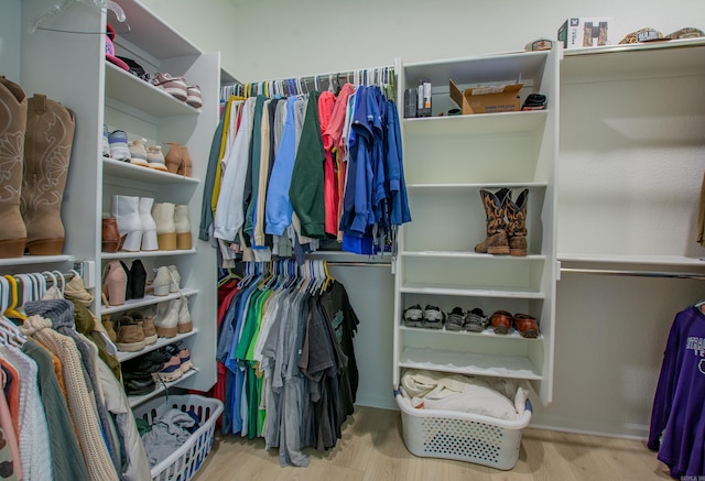 18508 Parkway Pines Dr, Bauxite, AR 72011 - spacious closet featuring wood finished floors