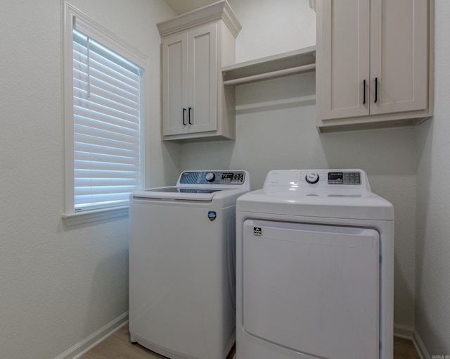 18508 Parkway Pines Dr, Bauxite, AR 72011 - washroom with separate washer and dryer and cabinet space