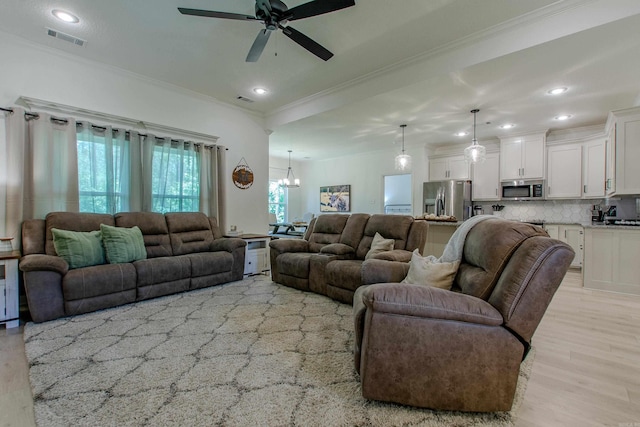 18508 Parkway Pines Dr, Bauxite, AR 72011 - living room with ornamental molding, ceiling fan, a chandelier, light wood-type flooring, and recessed lighting