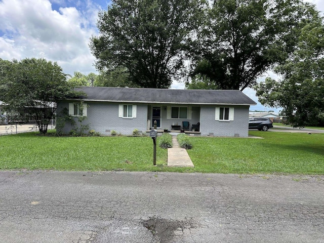207 Byron St, Beebe, AR 72012 - single story home featuring brick siding, a front yard, and covered porch