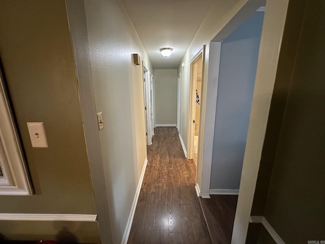207 Byron St, Beebe, AR 72012 - hall featuring dark wood-type flooring and baseboards