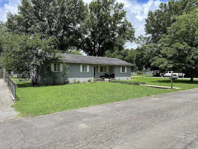 207 Byron St, Beebe, AR 72012 - view of front of house featuring brick siding and covered porch