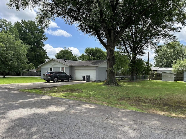 207 Byron St, Beebe, AR 72012 - view of front of house with asphalt driveway and a garage