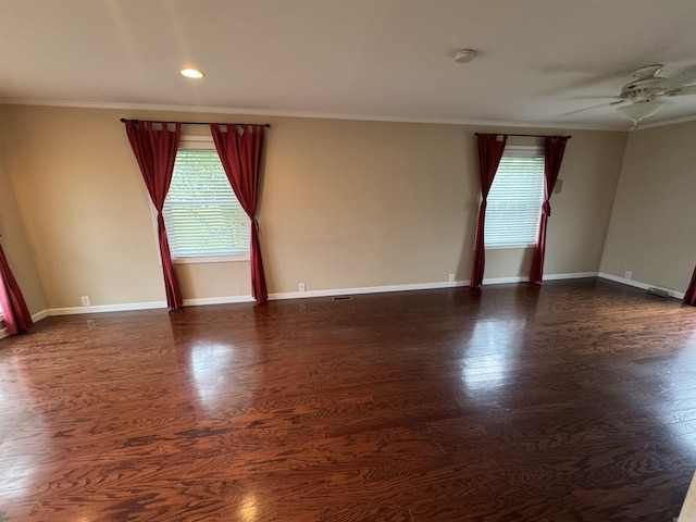 2025 Fairway St, Stuttgart, AR 72160 - unfurnished room with crown molding, plenty of natural light, a ceiling fan, dark wood finished floors, and recessed lighting