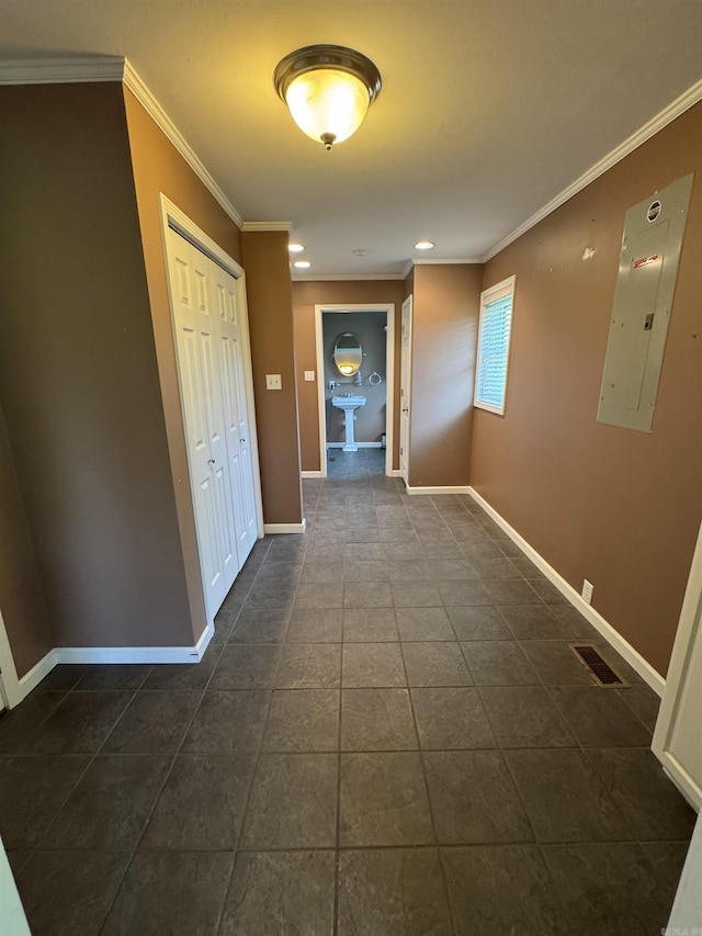 2025 Fairway St, Stuttgart, AR 72160 - hall featuring electric panel, crown molding, dark tile patterned floors, and recessed lighting