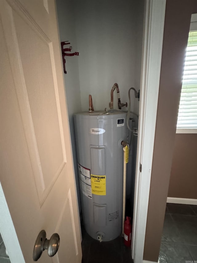 2025 Fairway St, Stuttgart, AR 72160 - utility room featuring electric water heater