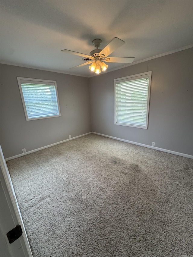 2025 Fairway St, Stuttgart, AR 72160 - carpeted spare room featuring ceiling fan and crown molding