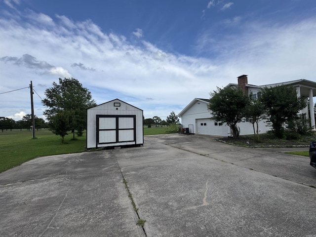2025 Fairway St, Stuttgart, AR 72160 - garage featuring a shed